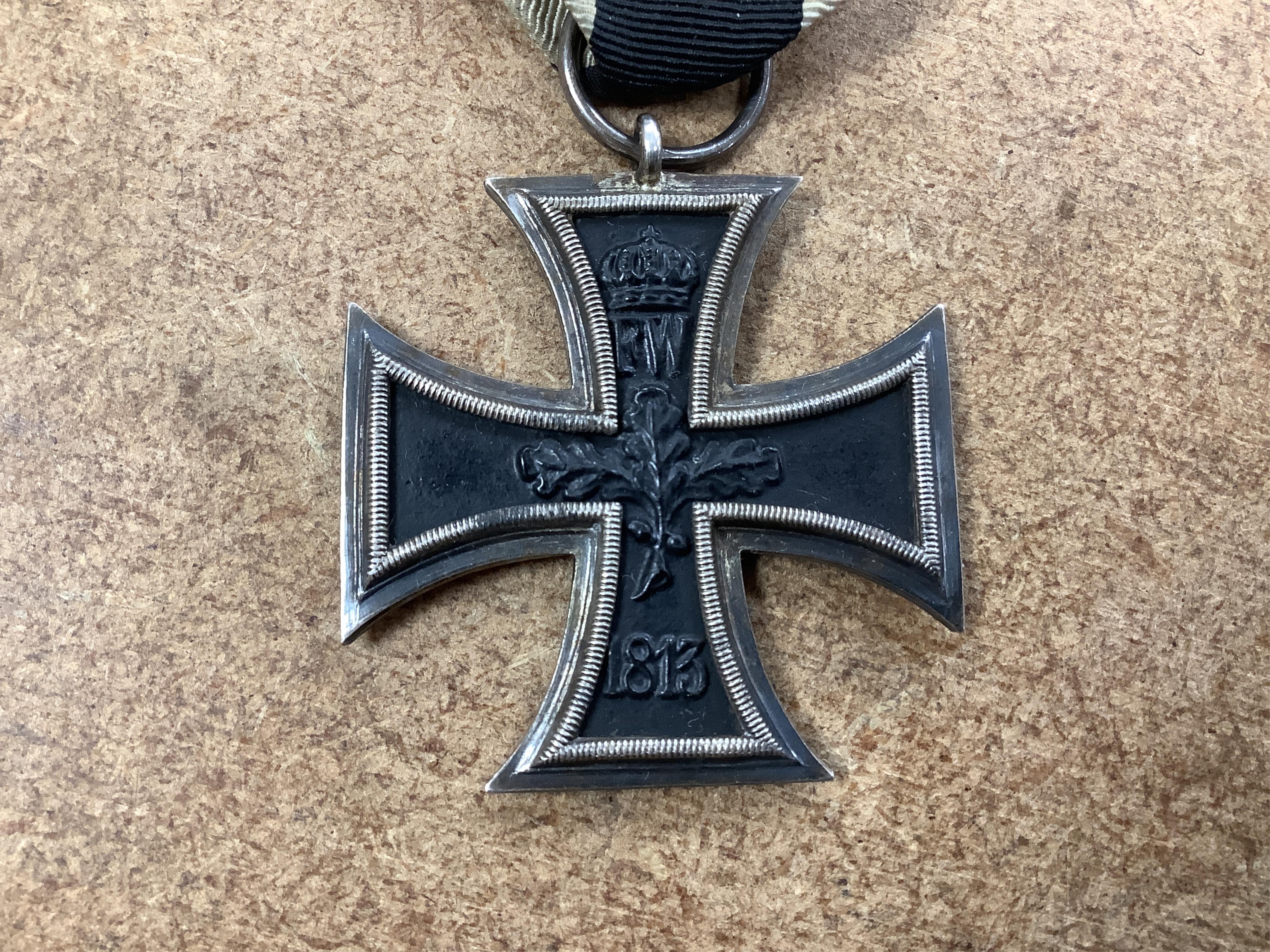 Four First World War German medals; a First Class Iron Cross, a 2nd Class Iron Cross, a 1914-1918 Honour Cross and an Austro-Hungarian Medal for Bravery, together with a wound badge and the related stick pin for the meda
